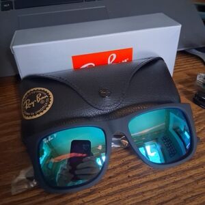 Ray-Ban Justin's Polarized Blue Flash Mirror Lenses w/ Black Rubberized Frame.
